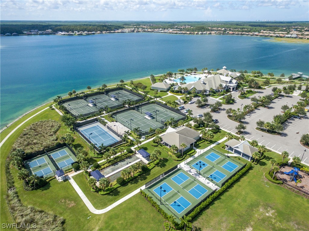 20198 Corkscrew Shores Boulevard Estero, FL 33928 - Photo 36 of 50 an aerial view of a residential houses with outdoor space and ocean view