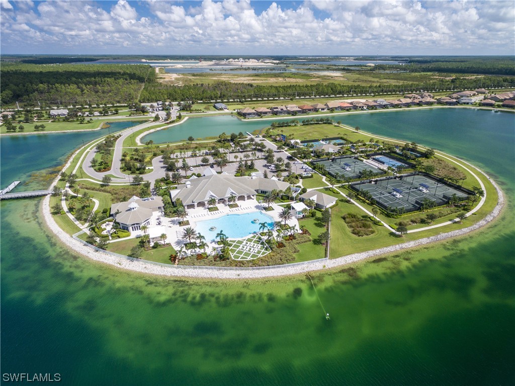 20198 Corkscrew Shores Boulevard Estero, FL 33928 - Photo 38 of 50 a view of a lake with a mountain in the background and lake view