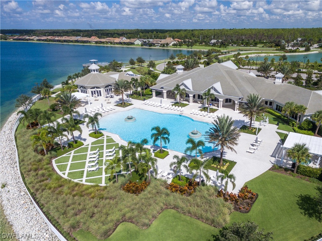 20198 Corkscrew Shores Boulevard Estero, FL 33928 - Photo 41 of 50 an aerial view of a house with a swimming pool outdoor seating and yard