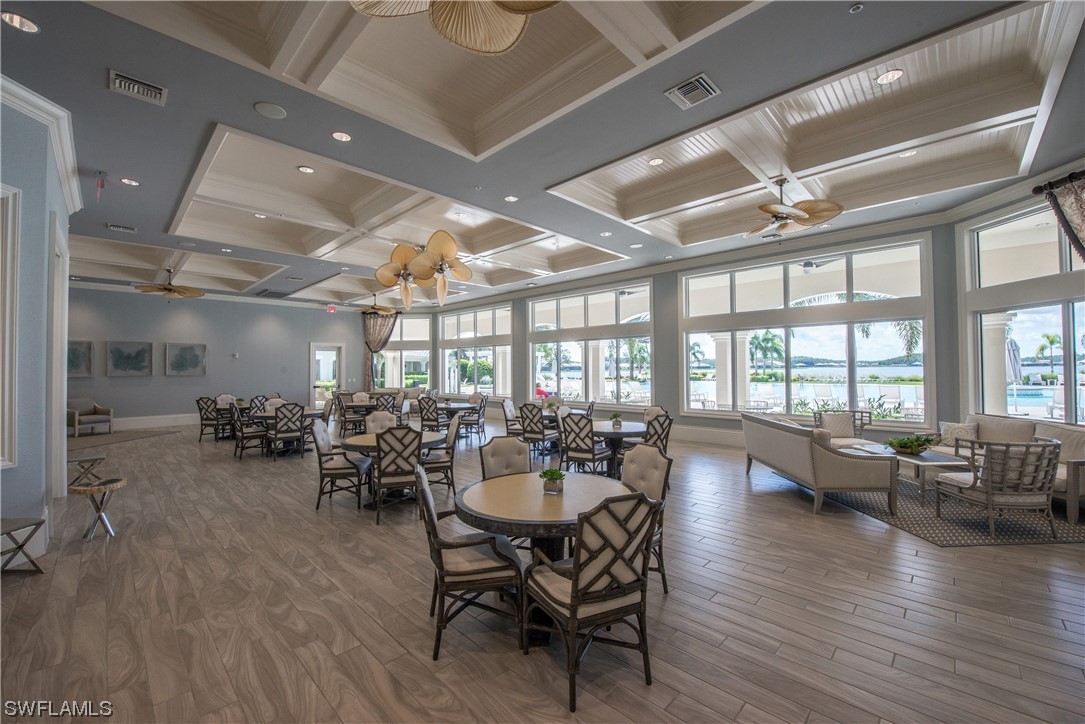 20198 Corkscrew Shores Boulevard Estero, FL 33928 - Photo 43 of 50 a view of a dining room with furniture window and wooden floor