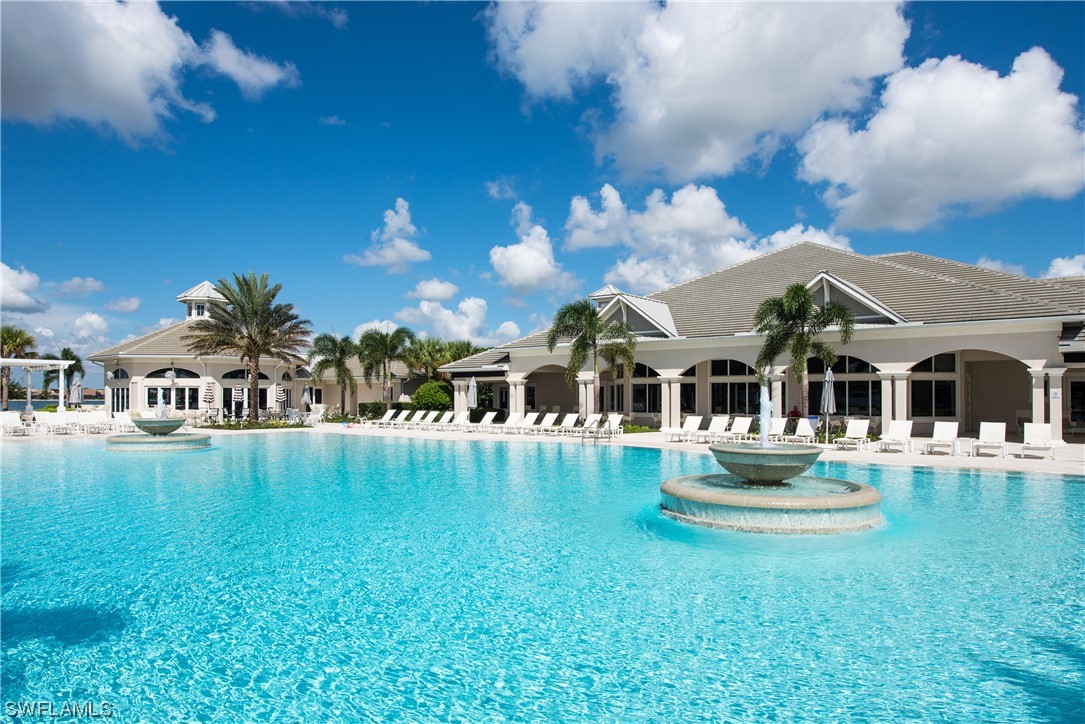 20198 Corkscrew Shores Boulevard Estero, FL 33928 - Photo 48 of 50 a front view of a house with a yard