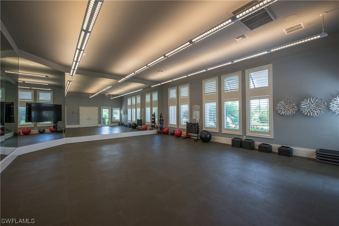 20198 Corkscrew Shores Boulevard Estero, FL 33928 - Photo 50 of 50 a view of a room with gym equipment