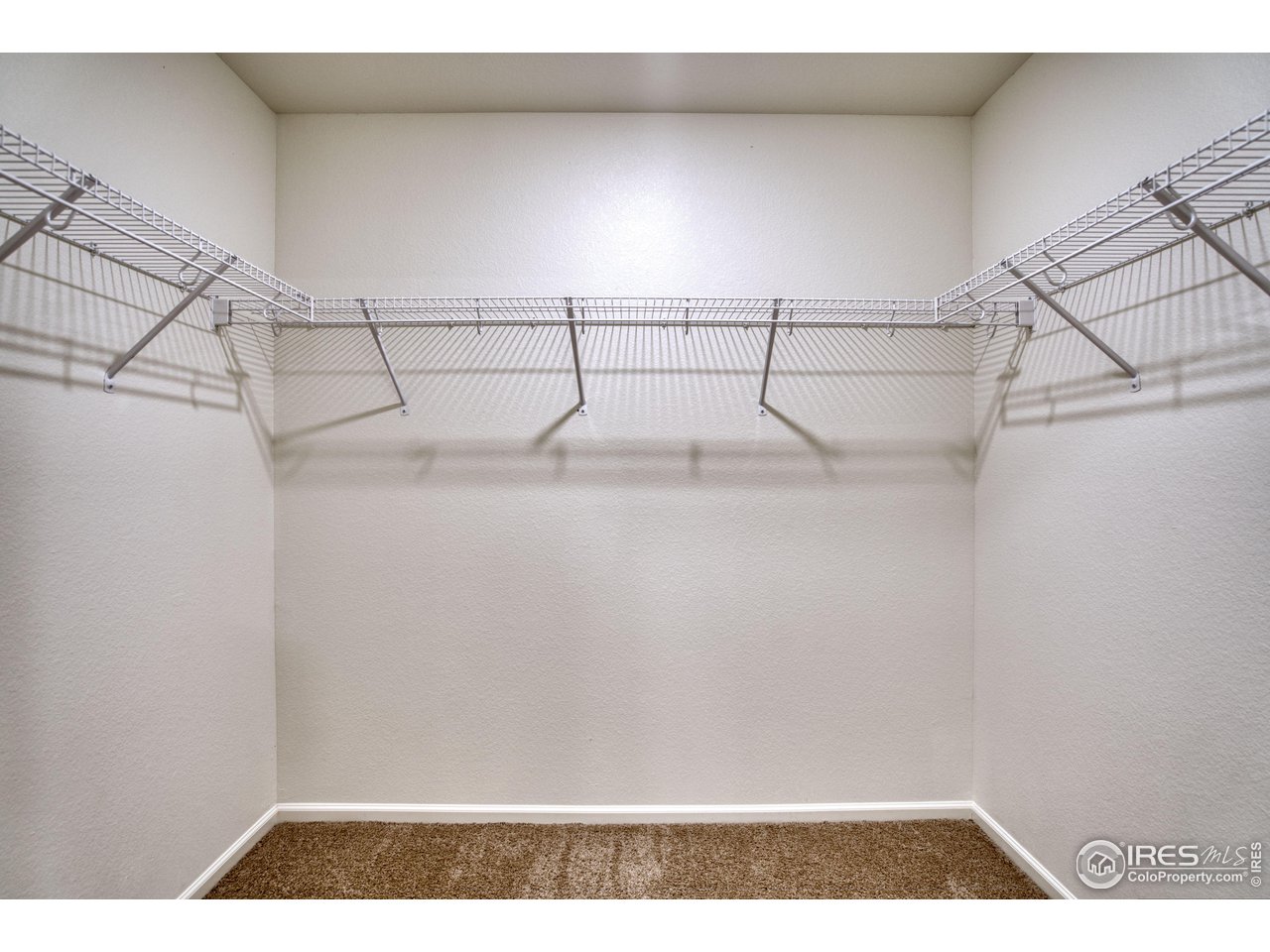 7015 Fall River Drive Frederick, CO 80530 - Photo 20 of 34 a view of a rack on the wall