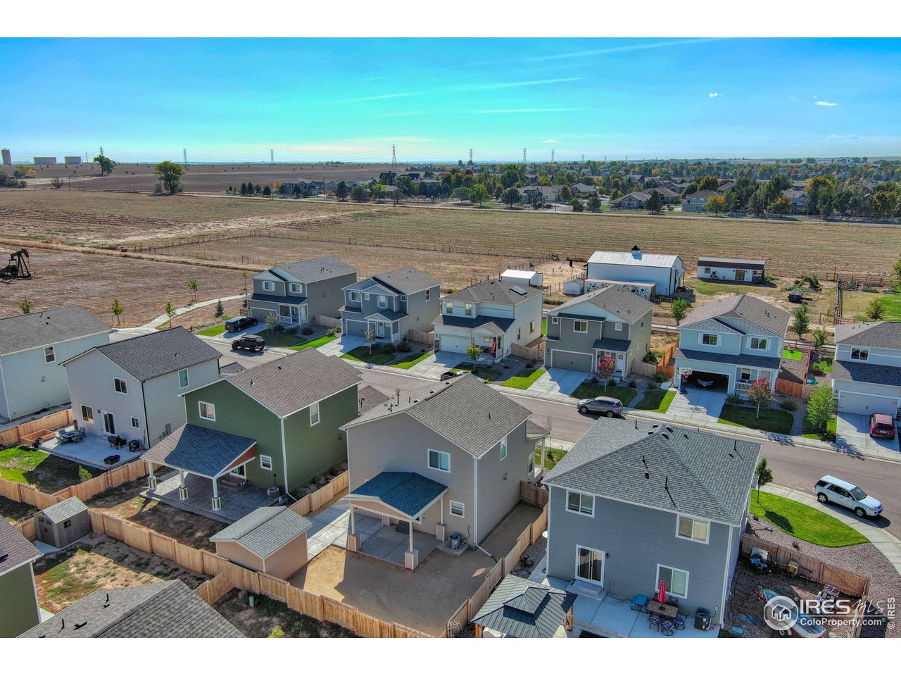7015 Fall River Drive Frederick, CO 80530 - Photo 34 of 34 an aerial view of a house with a lake view