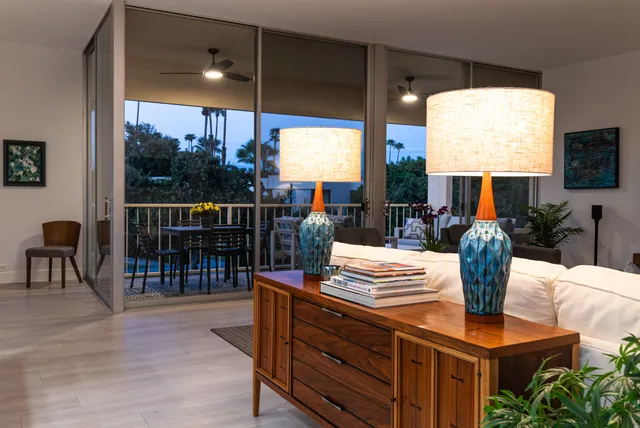 a kitchen with a table and chairs