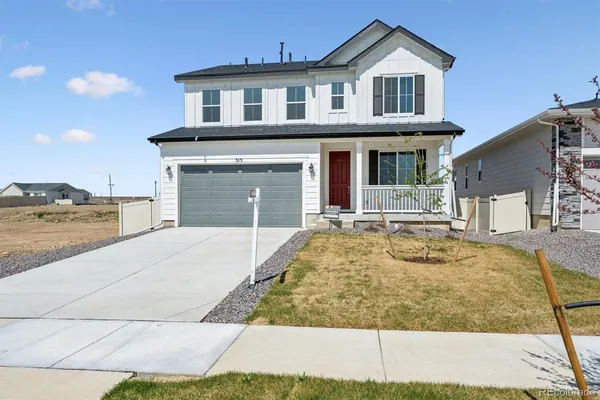 a front view of a house with entertaining space