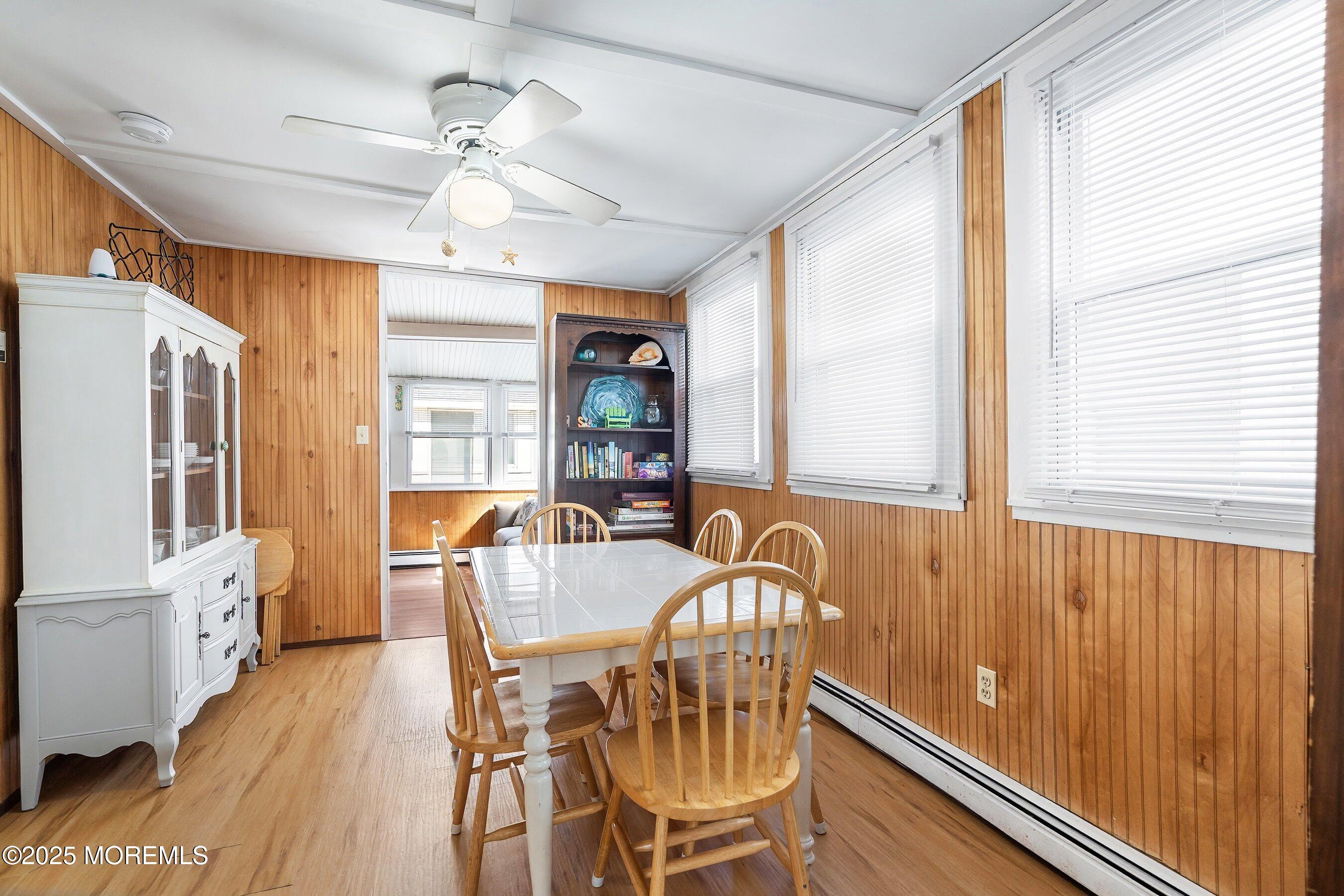 10 Brunswick Place Point Pleasant Beach, NJ 08742 - Photo 14 of 39 a view of a dining room with furniture window and wooden floor
