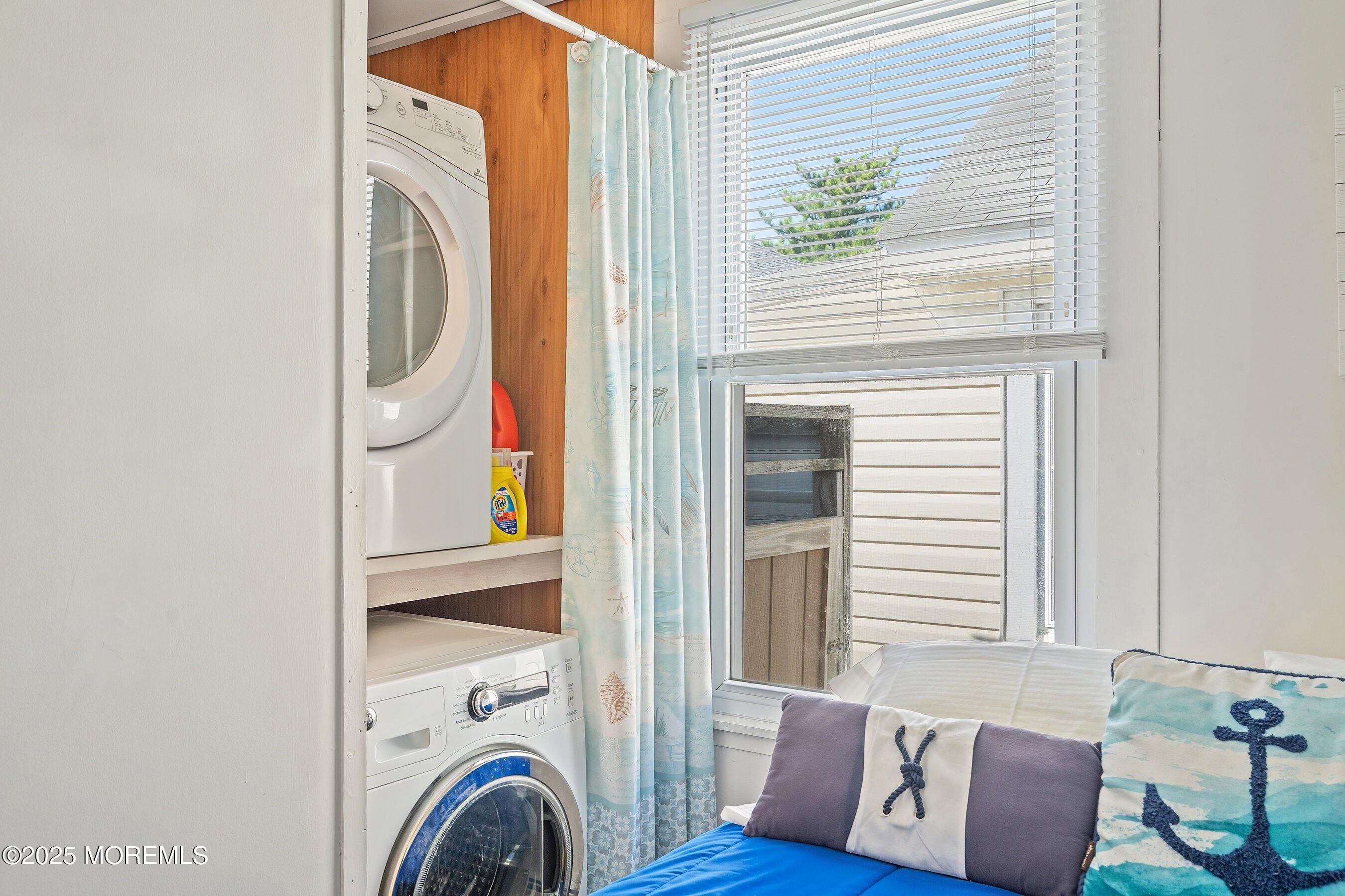 10 Brunswick Place Point Pleasant Beach, NJ 08742 - Photo 16 of 39 a view of a bedroom with washer and dryer