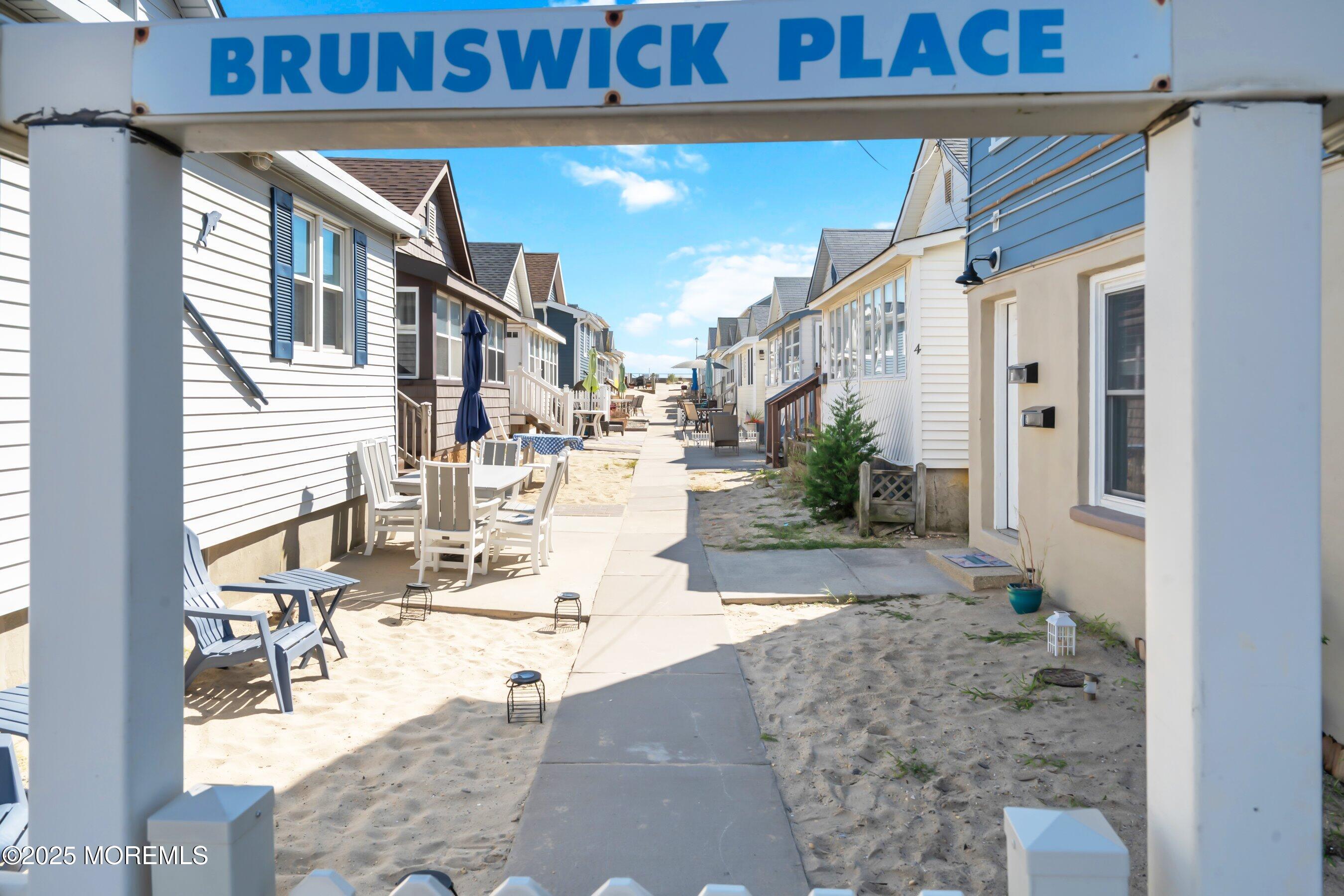 10 Brunswick Place Point Pleasant Beach, NJ 08742 - Photo 6 of 39 a view of a patio with couches and chairs