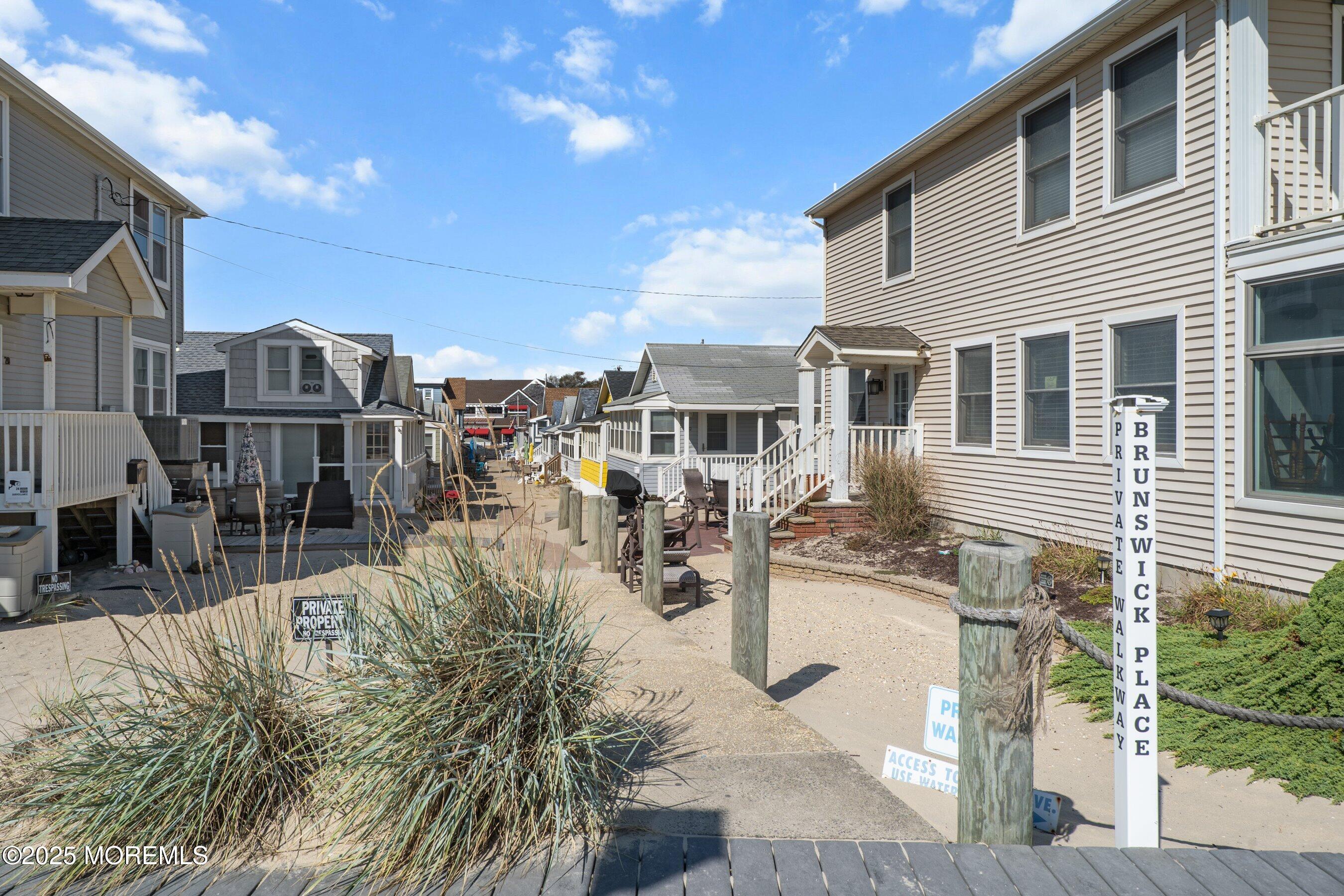 10 Brunswick Place Point Pleasant Beach, NJ 08742 - Photo 7 of 39 a view of a house with a yard