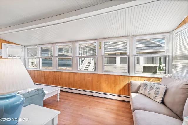a kitchen with granite countertop a sink appliances cabinets and a counter space