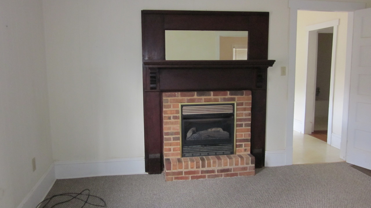 331 Monty Road Boones Mill, VA 24065 - Photo 22 of 27 a living room with a fireplace