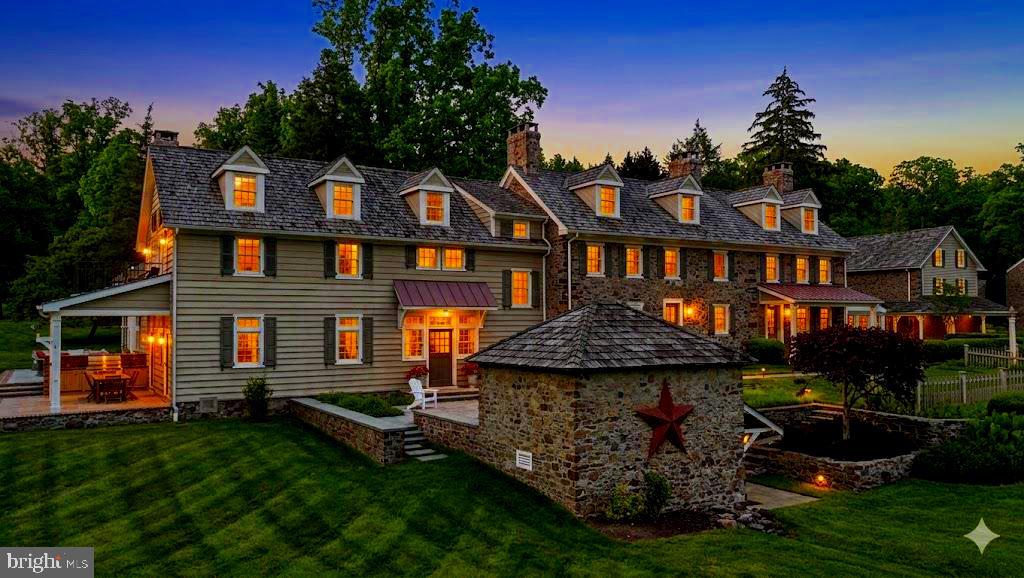 465 Pineville Road Newtown, PA 18940 - Photo 6 of 146 Front Elevation and Spring House at Dusk