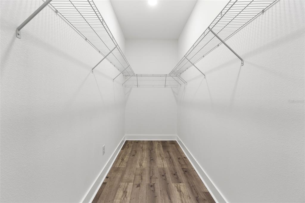 12248 Southwest 96th Lane Dunnellon, FL 34432 - Photo 20 of 26 a view of a room with wooden floor