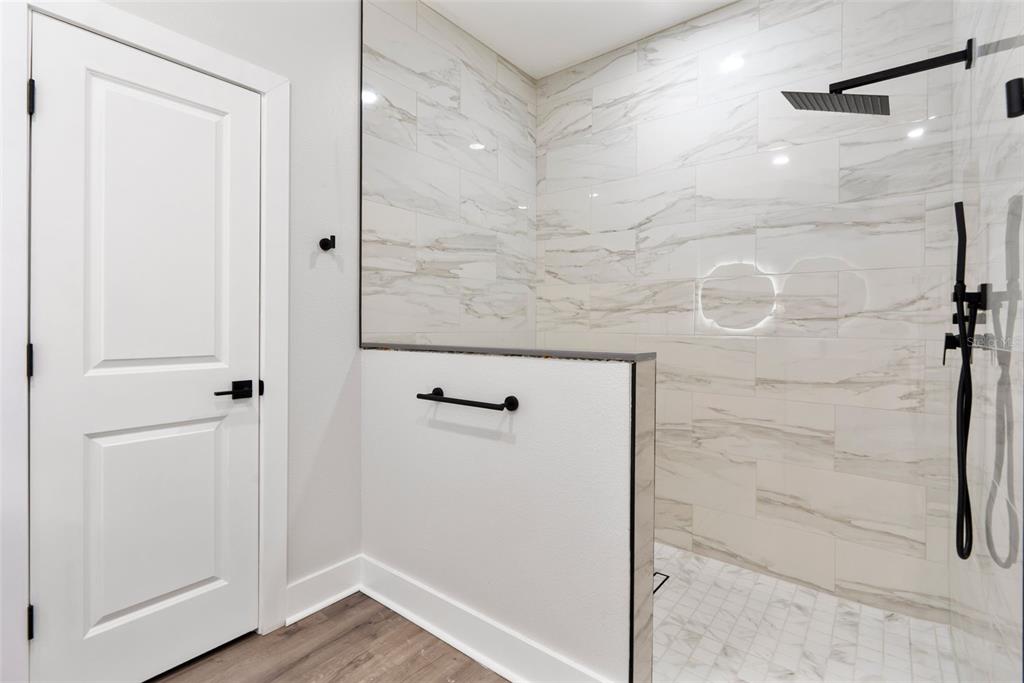 12248 Southwest 96th Lane Dunnellon, FL 34432 - Photo 23 of 26 a bathroom with a shower