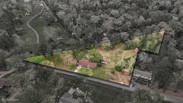 a living room with fireplace furniture and a flat screen tv