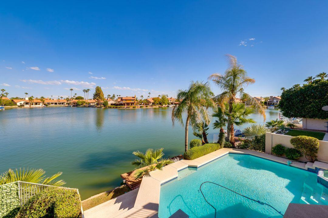 16439 South 34th Way Phoenix, AZ 85048 - Photo 31 of 33 a view of a lake with couches chairs