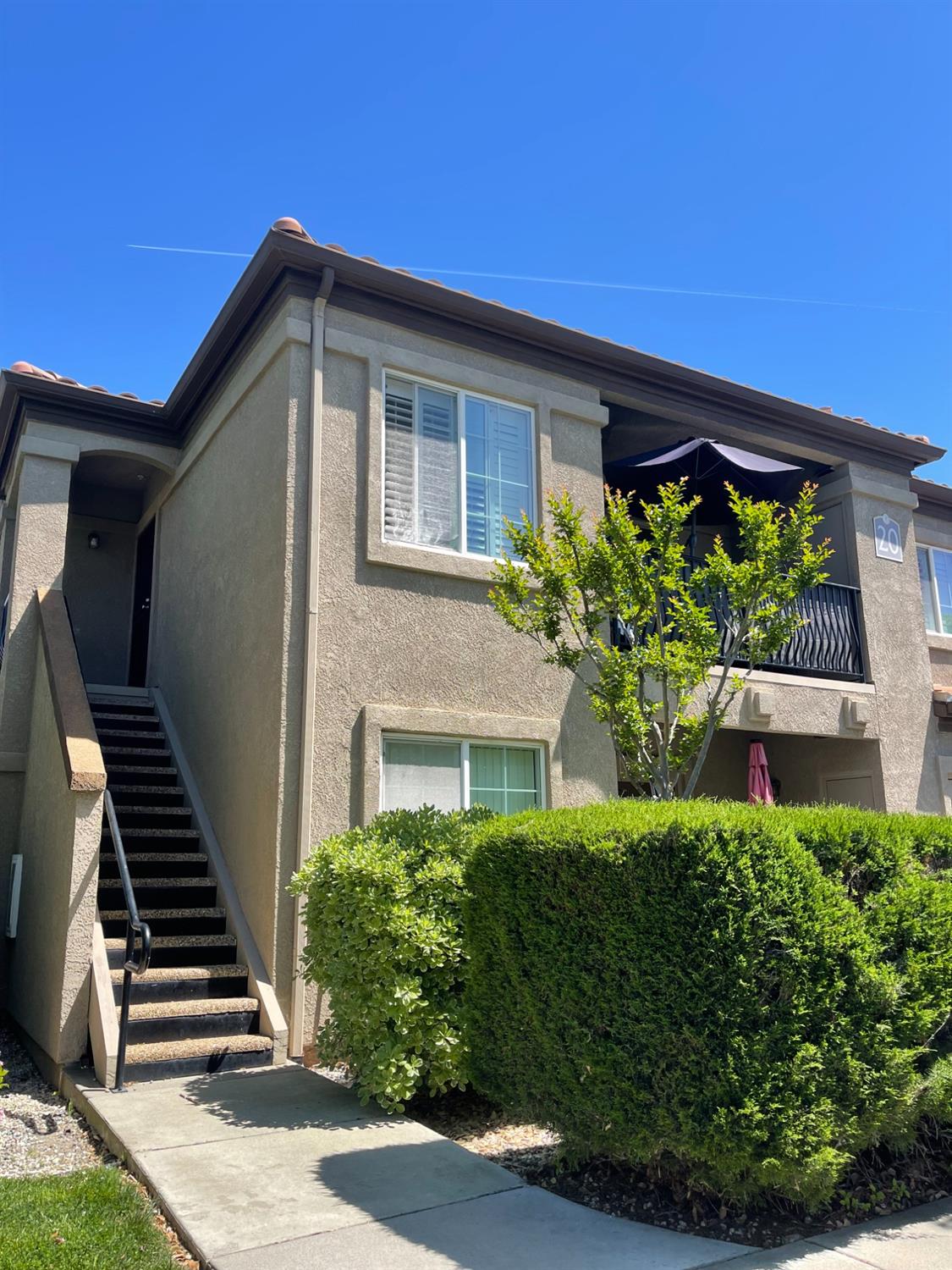 4200 East Commerce Way, Unit 2023 Sacramento, CA 95834 - Photo 1 of 12 front view of a house with a yard
