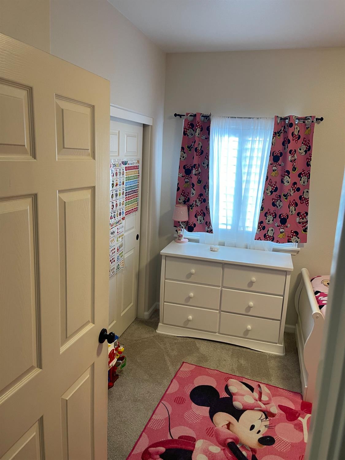 4200 East Commerce Way, Unit 2023 Sacramento, CA 95834 - Photo 7 of 12 a bedroom with a bed and a window