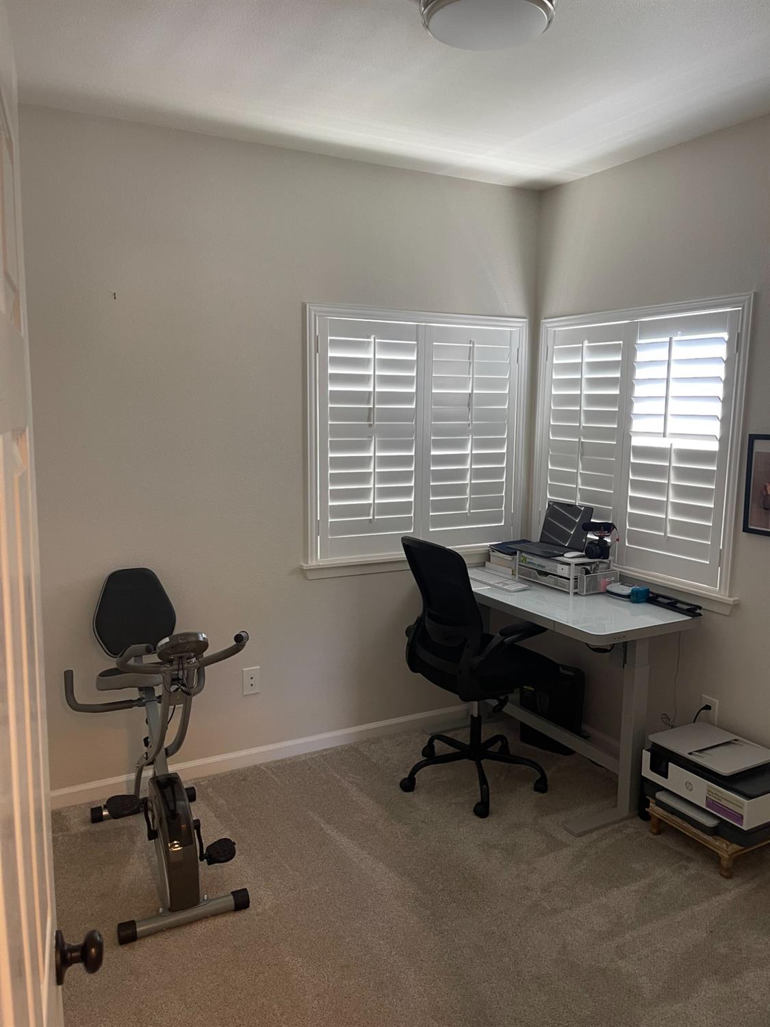 4200 East Commerce Way, Unit 2023 Sacramento, CA 95834 - Photo 9 of 12 a view of a workspace with furniture and a window