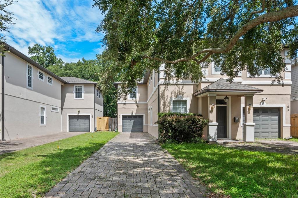 41 East Spruce Street Orlando, FL 32804 - Photo 1 of 1 a front view of a house with a garden