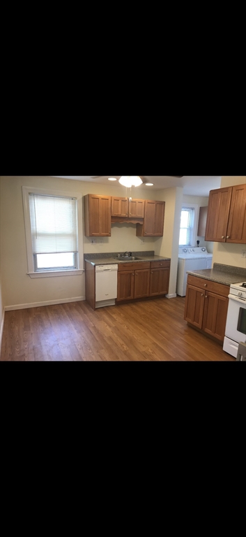 66 Brock Street, Unit 3 Boston, MA 02135 - Photo 2 of 15 a view of back yard