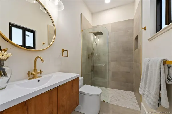 a white bath tub sitting in a bathroom