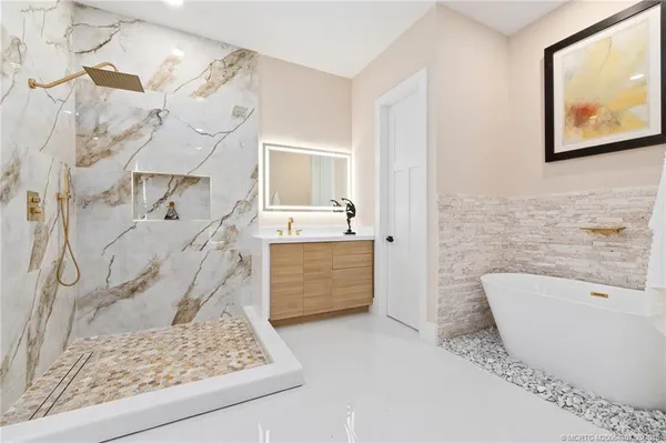 a bed room with a bed and a window