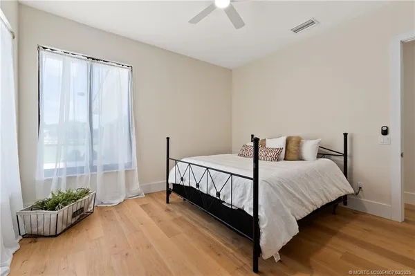 a room with furniture and a wooden floor