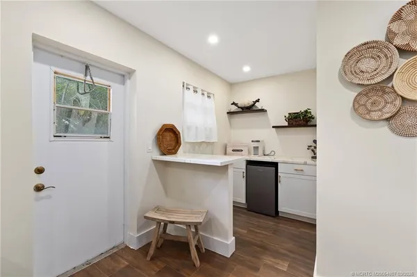 a view of a lake with a yard