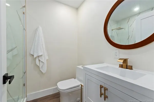 an aerial view of a house with a garden