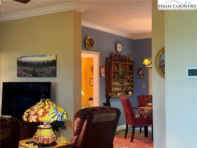 a view of a livingroom with furniture window and outside view