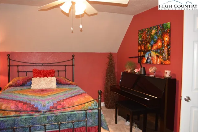 a room with gym equipment and a large window