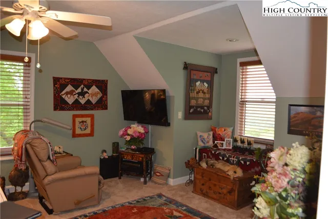 a view of balcony with furniture