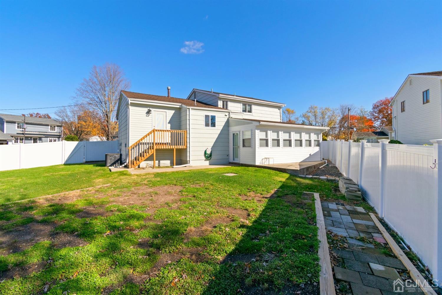 50 Gramercy Road Old Bridge, NJ 08857 - Photo 22 of 23 a view of a house with a yard