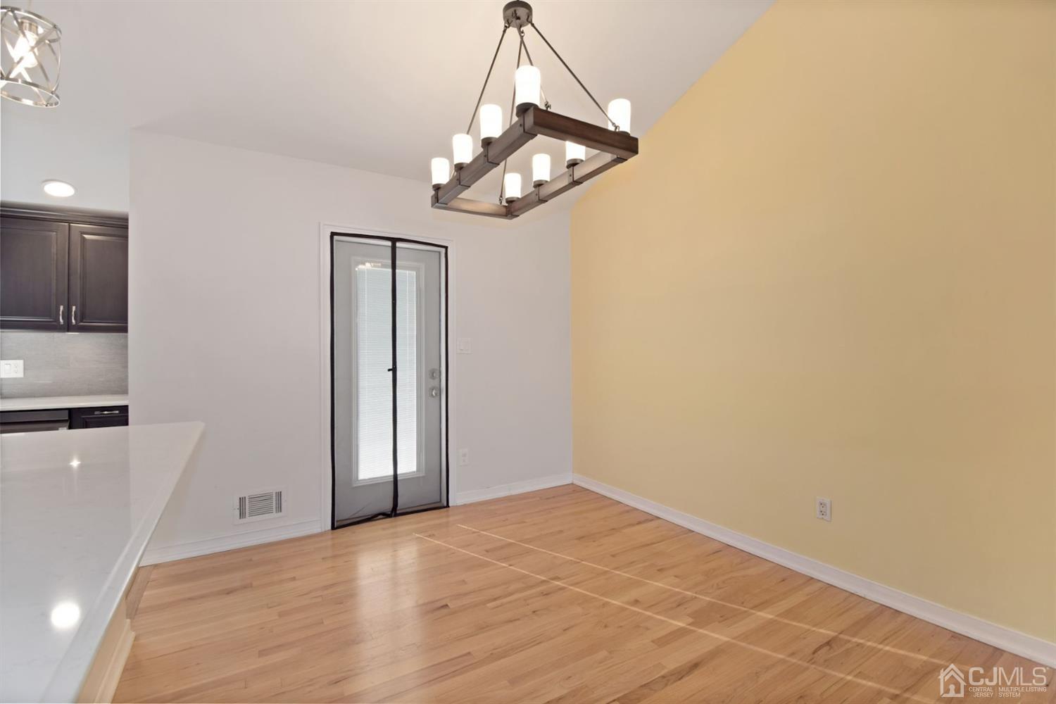 50 Gramercy Road Old Bridge, NJ 08857 - Photo 7 of 23 a view of a livingroom with a kitchen