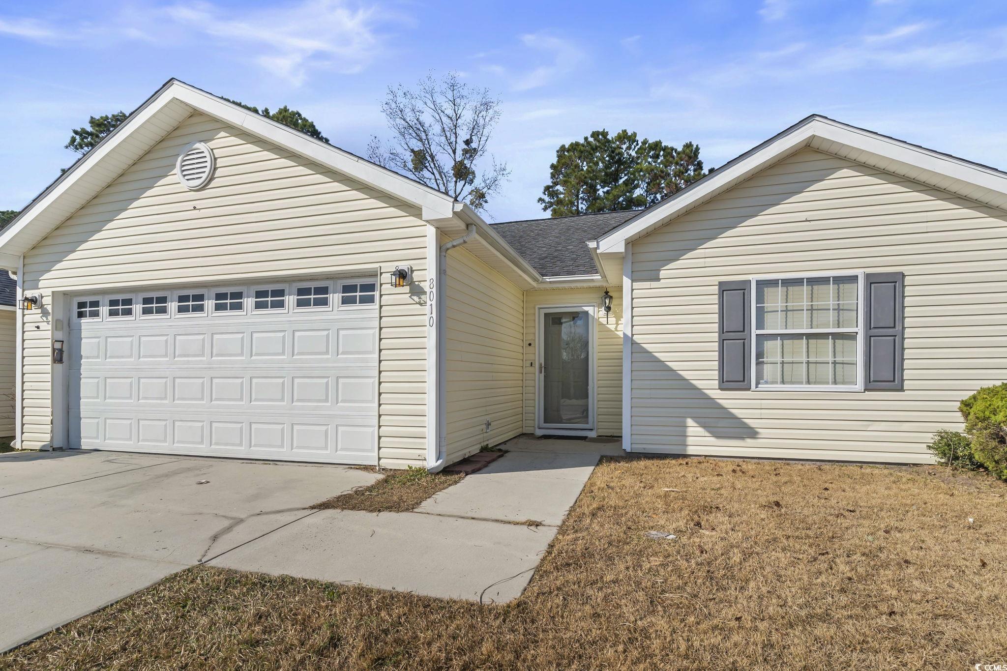 8010 Cone Court Murrells Inlet, SC 29576 - Photo 24 of 29 Ranch-style home featuring concrete driveway, roof with shingles, and a garage