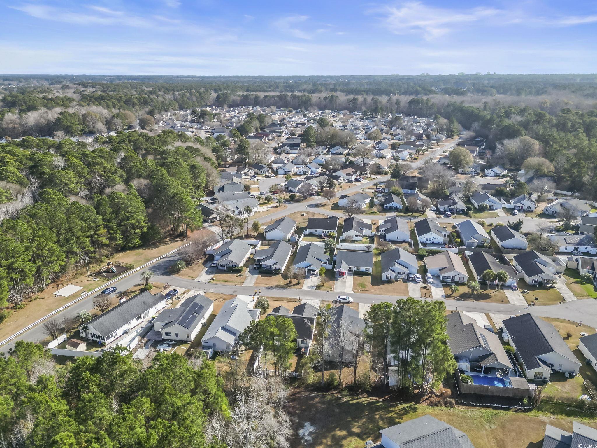 8010 Cone Court Murrells Inlet, SC 29576 - Photo 26 of 29 Aerial overview of property's location with nearby suburban area