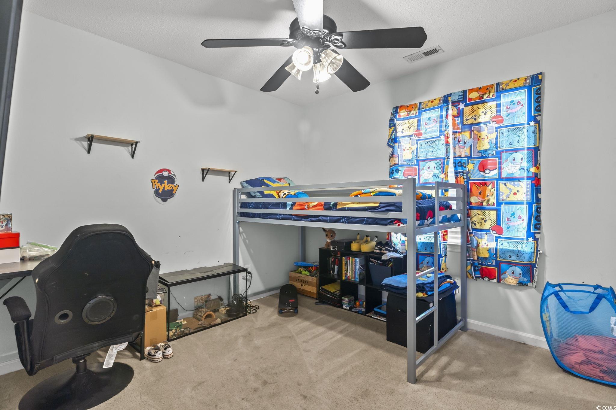 8010 Cone Court Murrells Inlet, SC 29576 - Photo 5 of 29 Bedroom featuring light carpet and ceiling fan