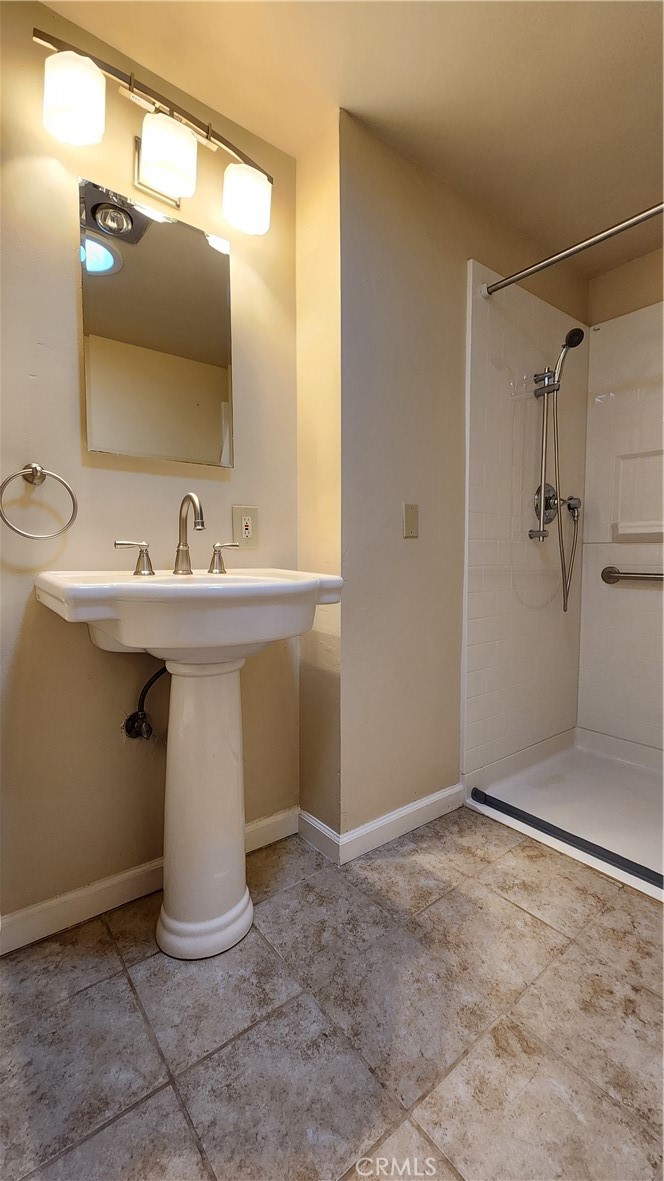 682 Taylor Street Monterey, CA 93940 - Photo 8 of 21 a bathroom with a sink and mirror