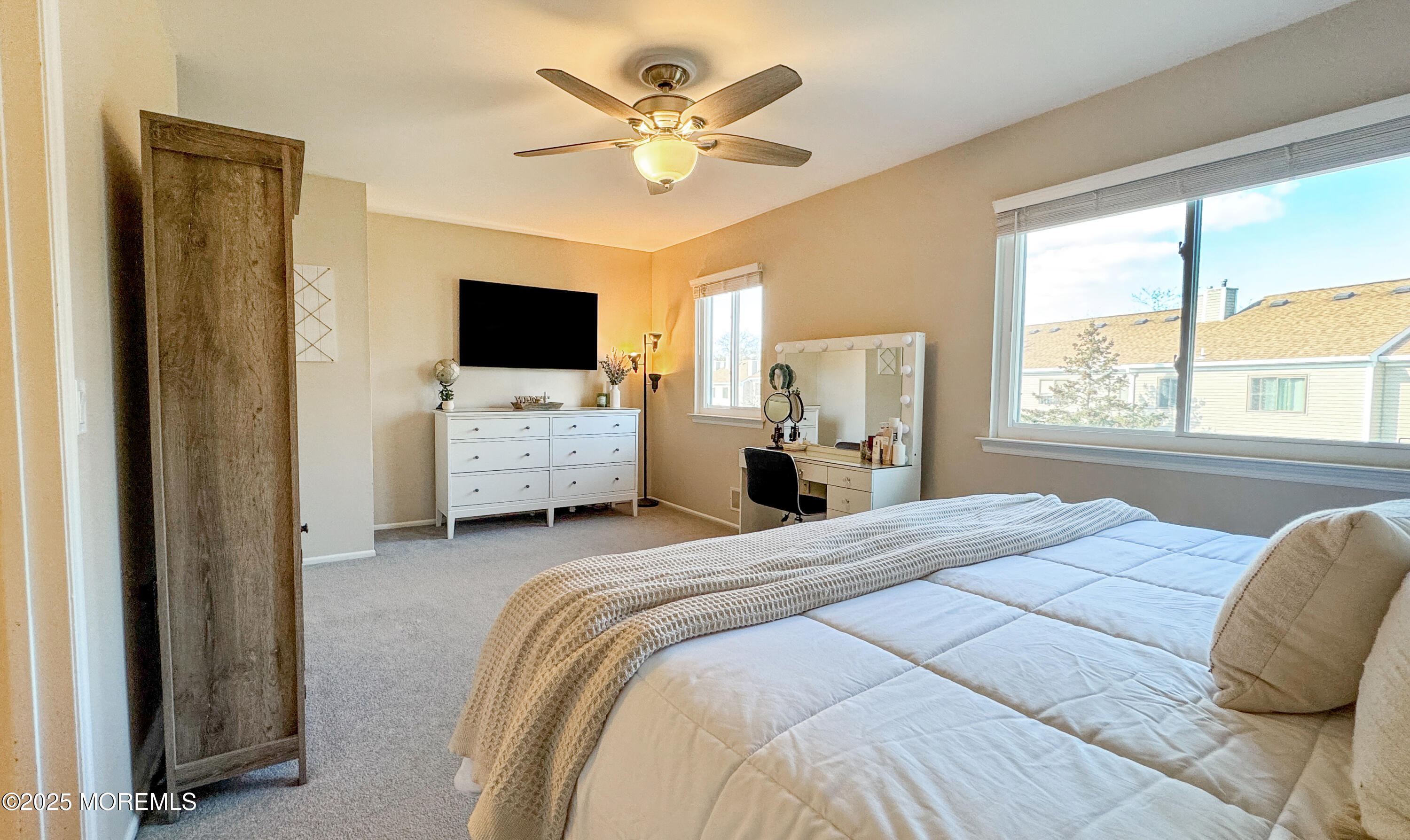 421 Sandra Place Brick, NJ 08724 - Photo 12 of 19 a bedroom with a bed and a flat screen tv