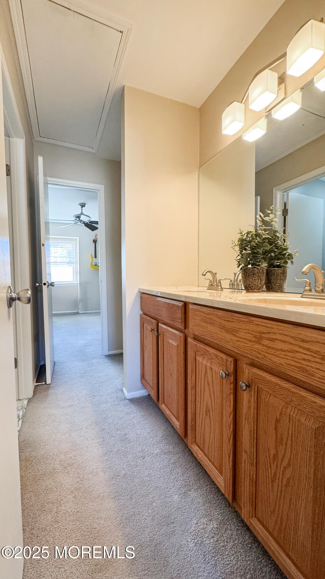 421 Sandra Place Brick, NJ 08724 - Photo 15 of 19 a bathroom with a sink and a mirror