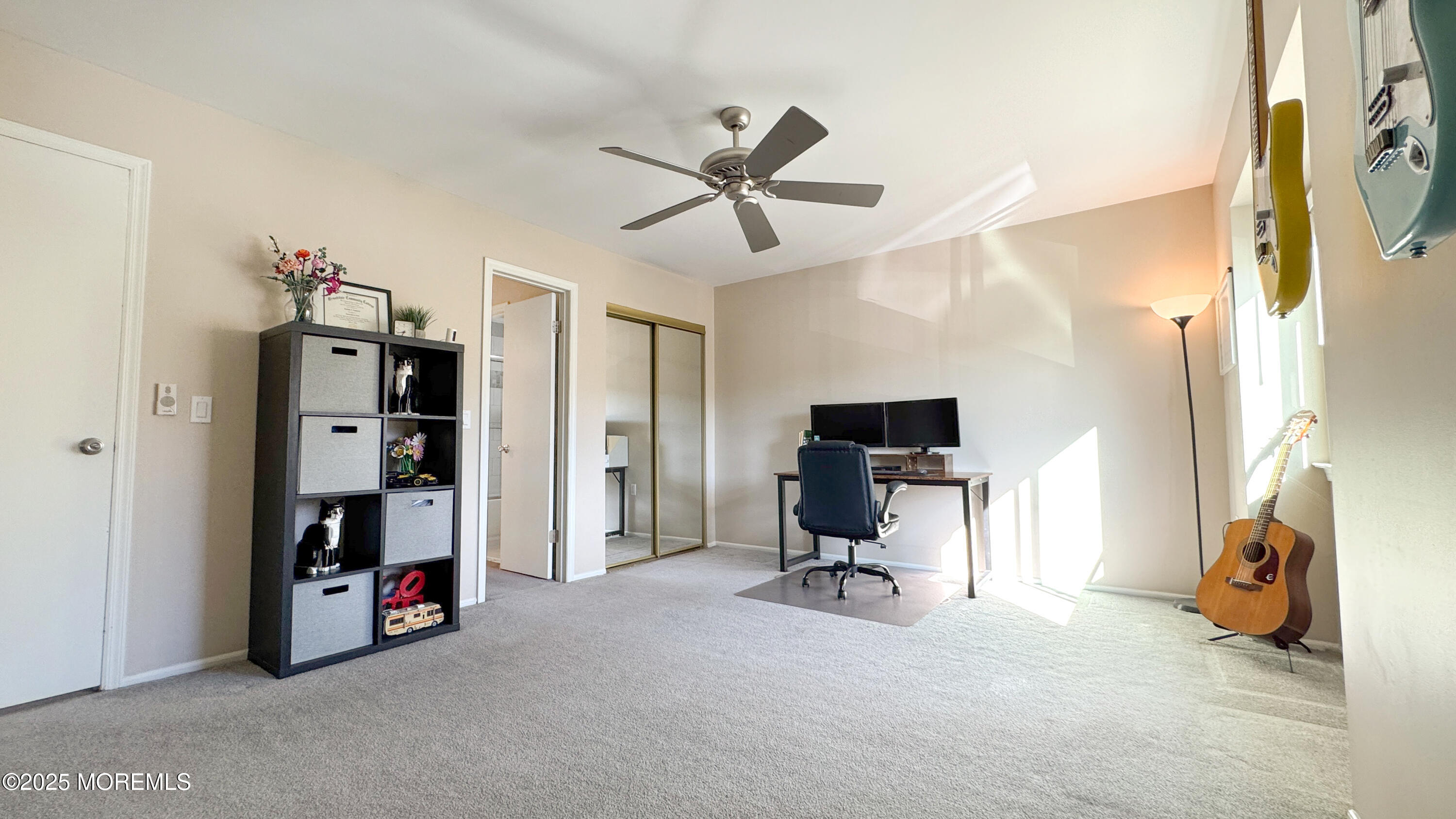 421 Sandra Place Brick, NJ 08724 - Photo 17 of 19 a room with closet and a chandelier