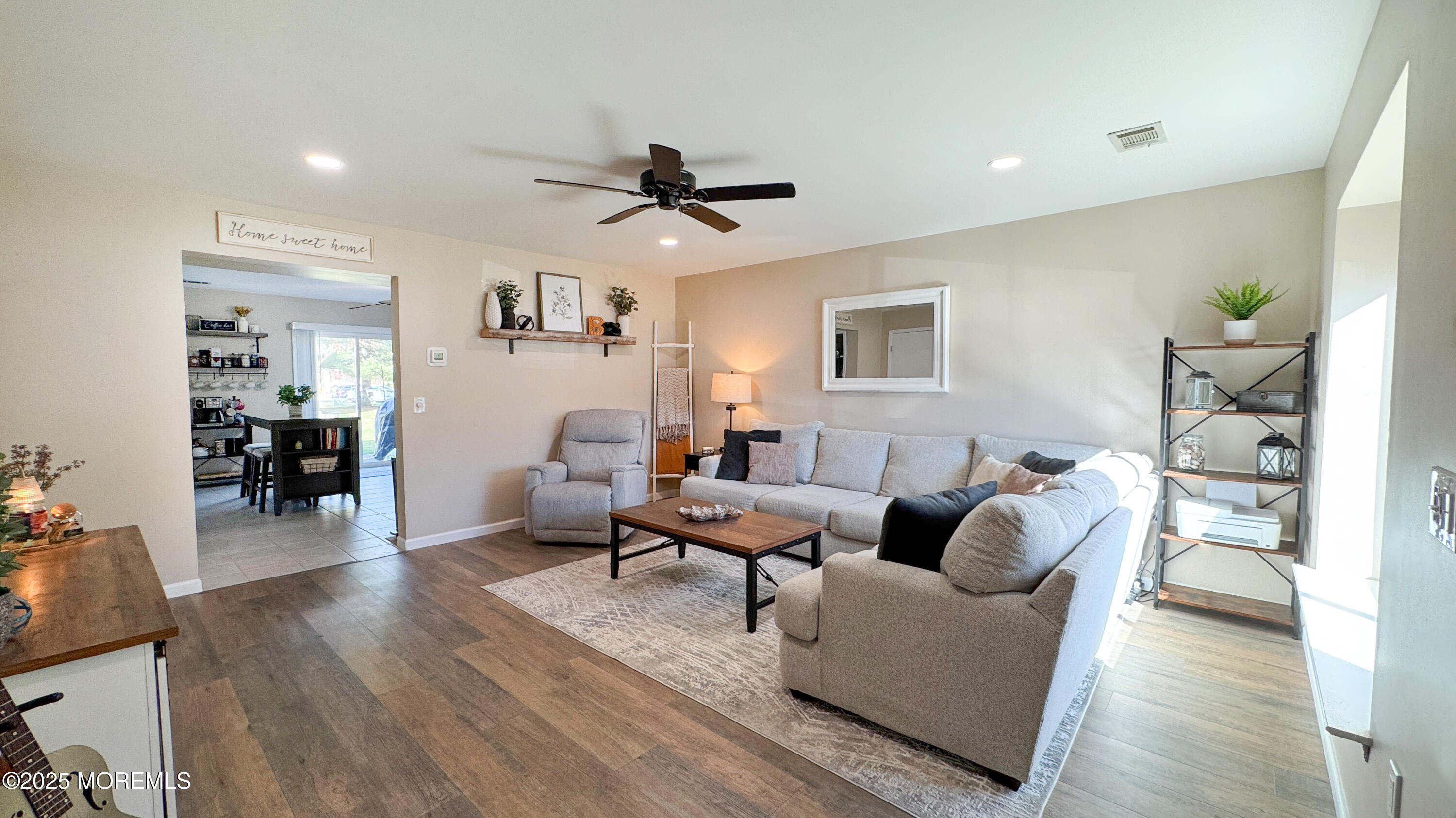 421 Sandra Place Brick, NJ 08724 - Photo 3 of 19 a living room with furniture and wooden floor
