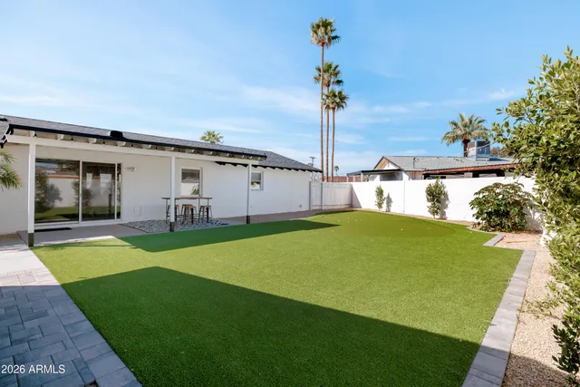 a house view with a garden space