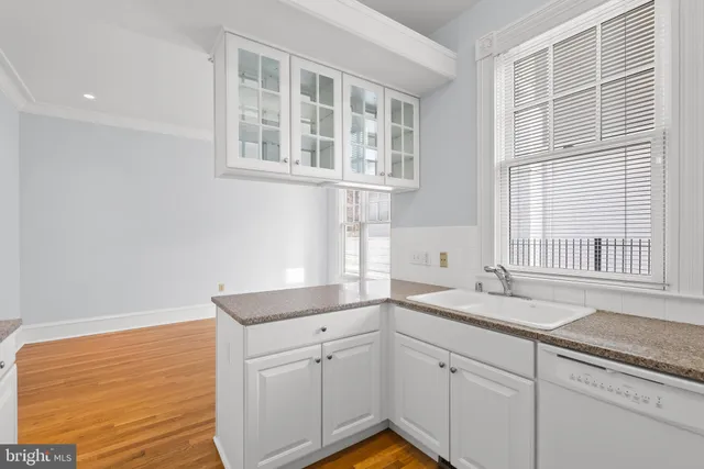 a view of a door and a street