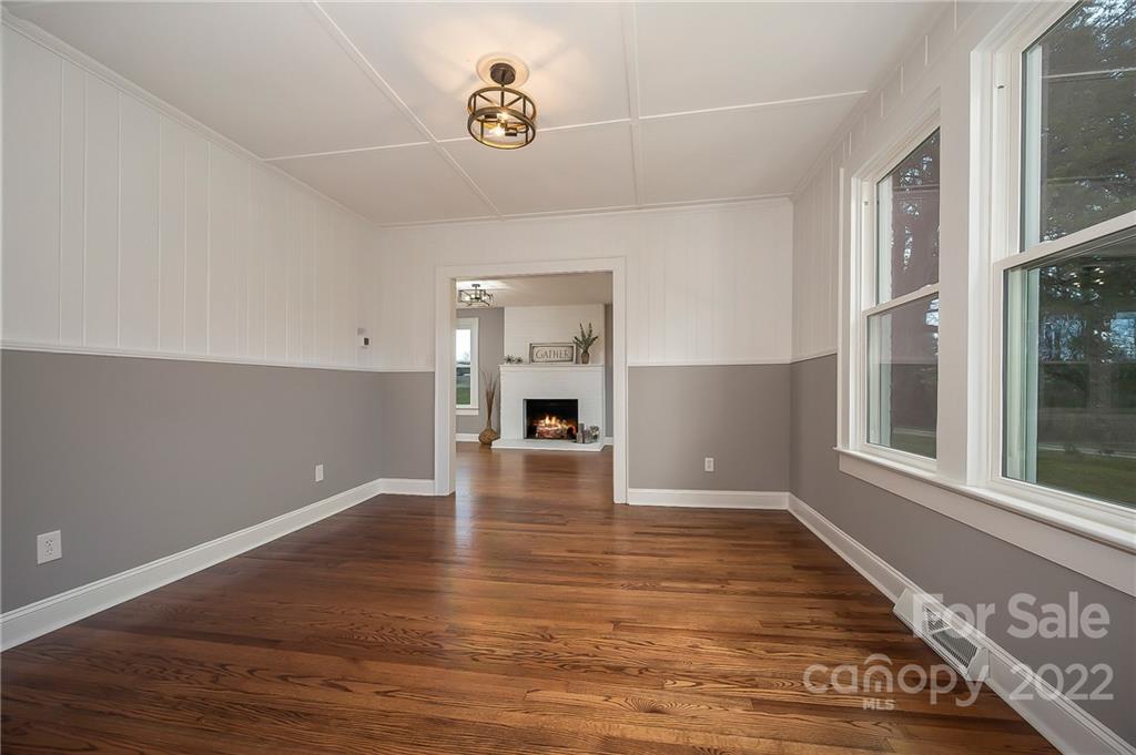 1141 Highway 64 Rutherfordton, NC 28139 - Photo 17 of 37 a view of empty room with wooden floor and window