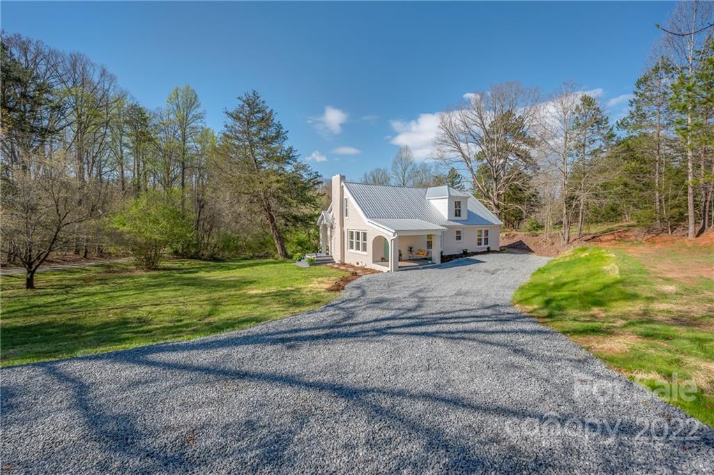 1141 Highway 64 Rutherfordton, NC 28139 - Photo 2 of 37 a view of a house with a yard