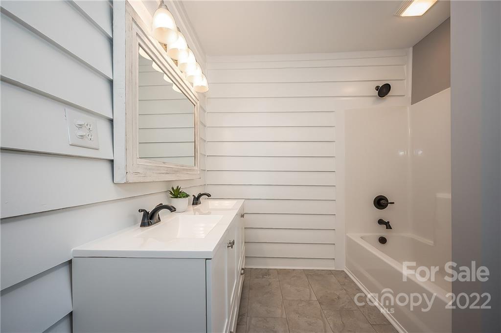1141 Highway 64 Rutherfordton, NC 28139 - Photo 26 of 37 a bathroom with a bathtub and shower