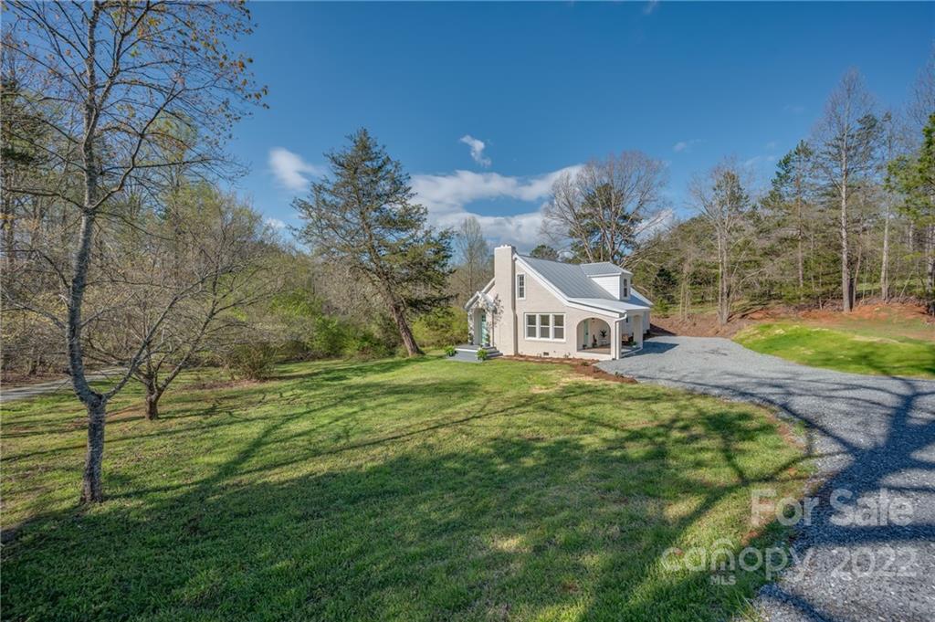 1141 Highway 64 Rutherfordton, NC 28139 - Photo 3 of 37 a view of a house with a yard